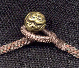 Katie Singer's Jewelry - bronze bead fastening